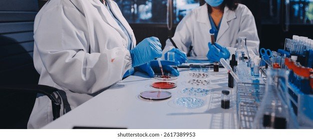 Laboratory scientists operating analytical instrumentation